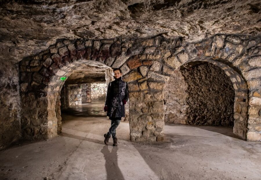 Budapest: Buda Castle Cave Tour - Human stories beneath your feet: wine cellars to bomb shelters to medieval prison