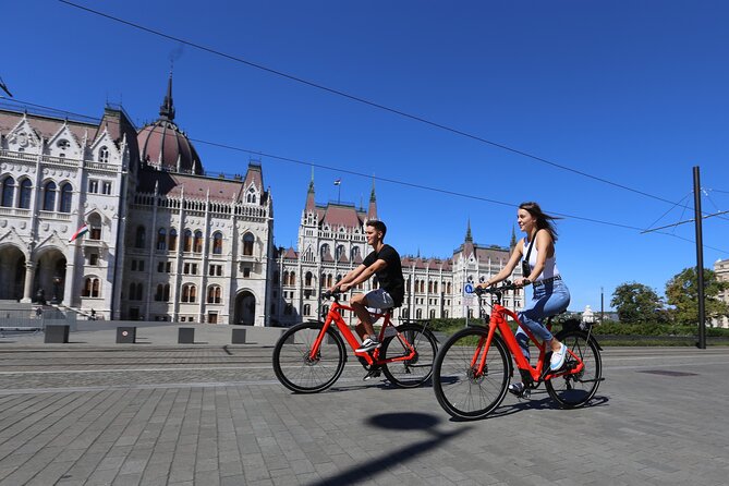 Budapest: Historic Downtown ride on E-Bicycles Buda & Pest - Baths area pass-bys, Liberty Bridge return, and Central Market Hall
