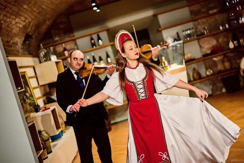 Budapest: Hungarian Folk Dance & Concert with Dinner Option - Arriving at Hungarian Gastro Cellar: stairs, timing, and a cozy setup