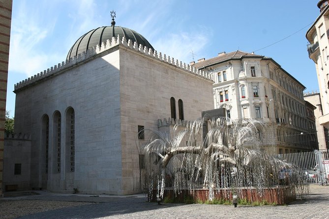 Budapest Jewish Heritage Memorial Walking Tour & Synagogue Entry - Food stops: Frohlich sweets and the Carmel 10% discount