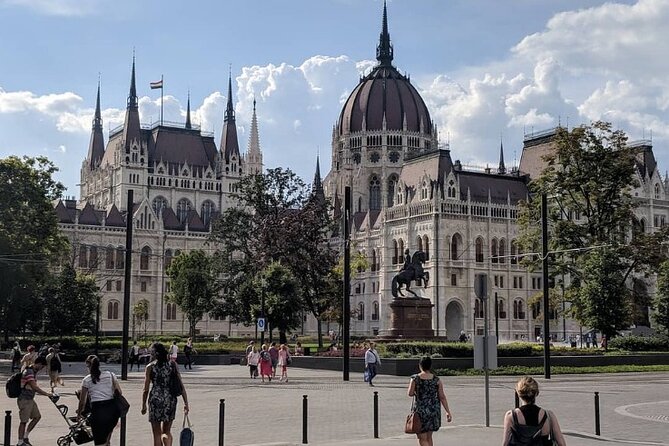 Budapest Private Full Day City Sightseeing Tour Walking or by Car - Szabadság Square: the story behind the monuments and the fountain pause
