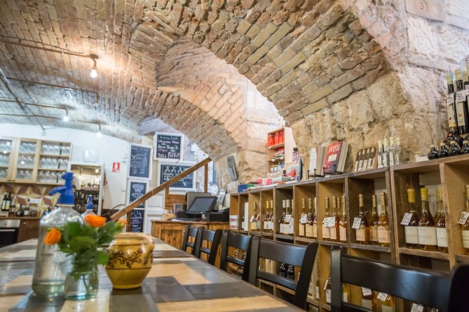Hungarian Wine Tasting (with Cheese and Charcuterie) in Budapest - Entering the Tasting Table Cellar: Setting Matters in Budapest