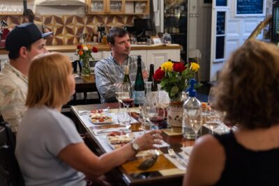 Palace District Evening Culinary, Wine, and History Walk - Tasting Table cellar start: 3 Hungarian wines plus cheese and charcuterie